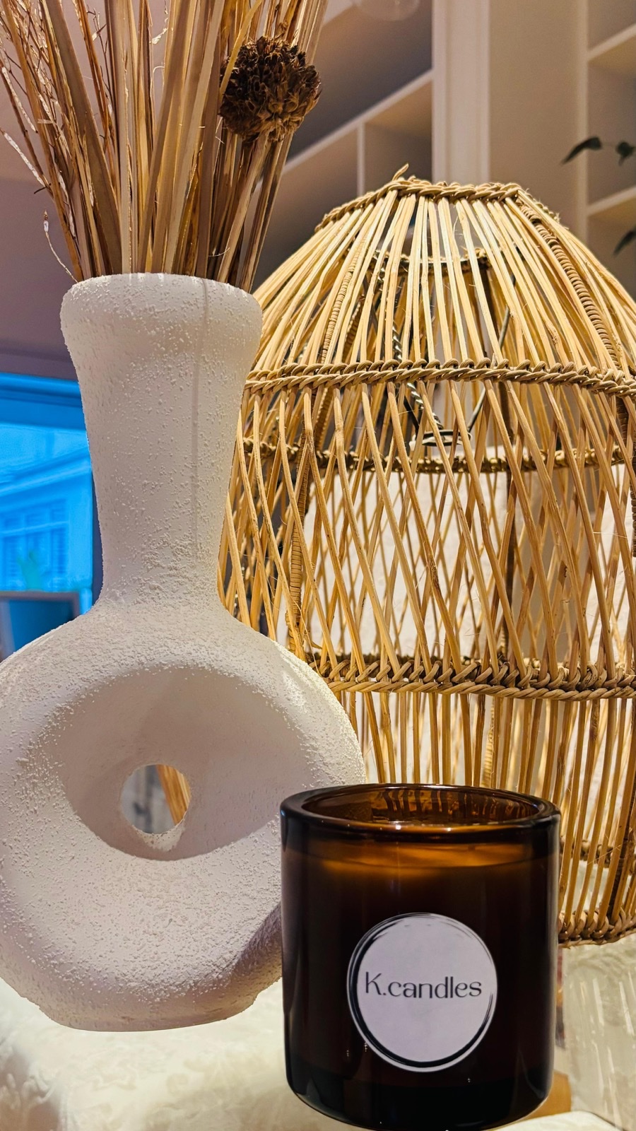 K.Candles handcrafted candles on a styled surface